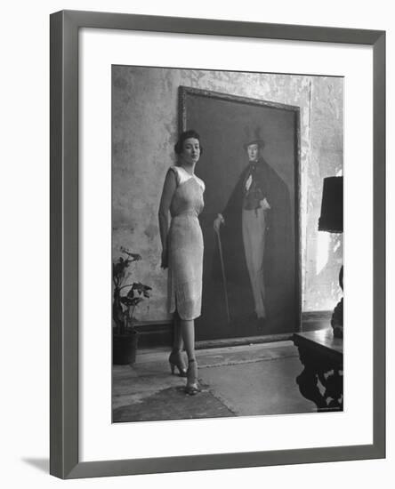 View of a Harper and Vogue Model in Designer Clothes-Nina Leen-Framed Photographic Print