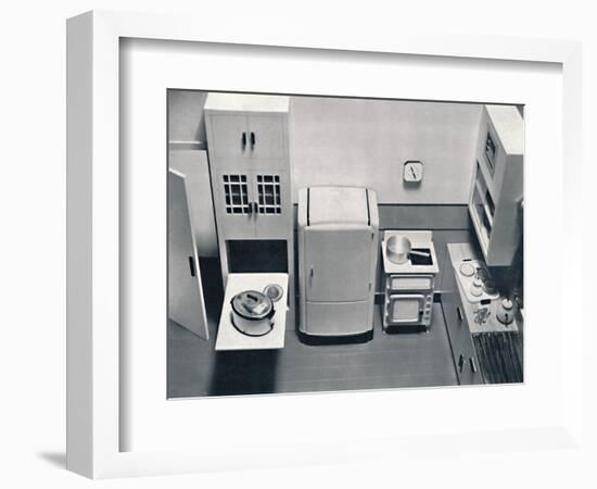 'View of a kitchen, designed by H.M.V. Household Appliances', 1938-Unknown-Framed Photographic Print