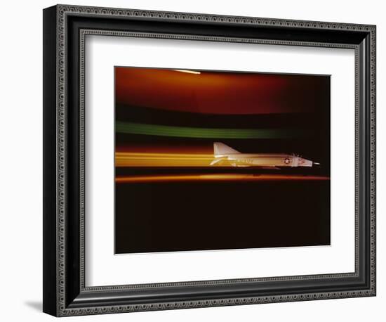 View of a Mcdonnell F-4 Jet as it Flies Against a Dark Sky, 1966-Yale Joel-Framed Photographic Print