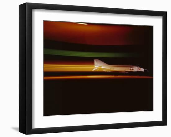 View of a Mcdonnell F-4 Jet as it Flies Against a Dark Sky, 1966-Yale Joel-Framed Photographic Print