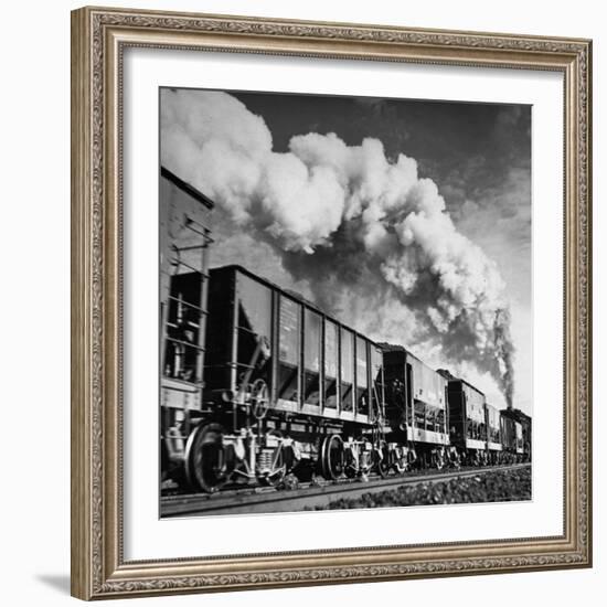 View of a Railcar Loaded with Iron Ore Moving Along the Tracks-Charles E^ Steinheimer-Framed Photographic Print