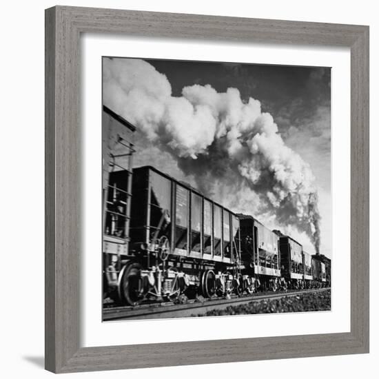 View of a Railcar Loaded with Iron Ore Moving Along the Tracks-Charles E^ Steinheimer-Framed Photographic Print