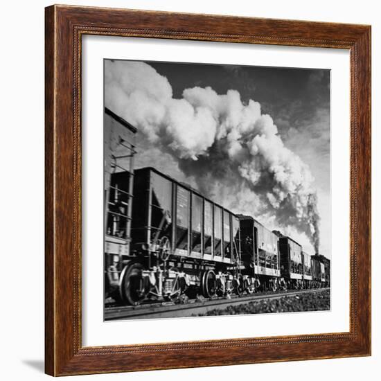 View of a Railcar Loaded with Iron Ore Moving Along the Tracks-Charles E^ Steinheimer-Framed Photographic Print