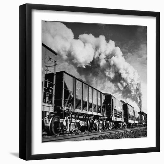 View of a Railcar Loaded with Iron Ore Moving Along the Tracks-Charles E^ Steinheimer-Framed Photographic Print