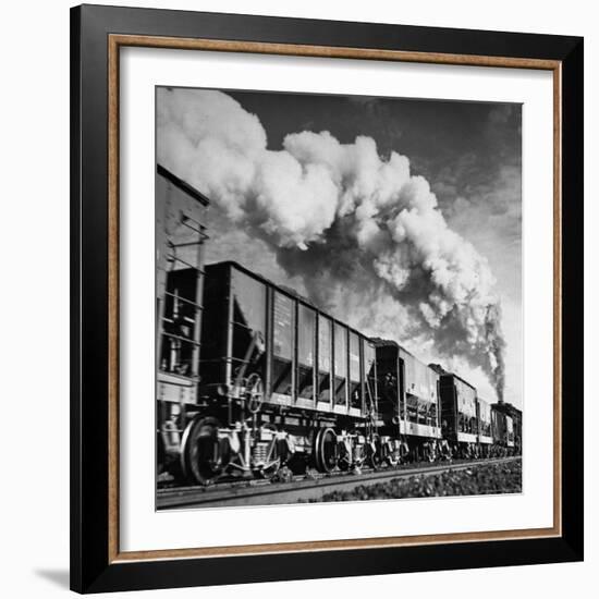 View of a Railcar Loaded with Iron Ore Moving Along the Tracks-Charles E^ Steinheimer-Framed Photographic Print