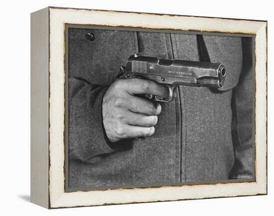 View of a Soldier Holding a US Army Colt Automatic .45 Caliber Pistol-William Vandivert-Framed Premier Image Canvas