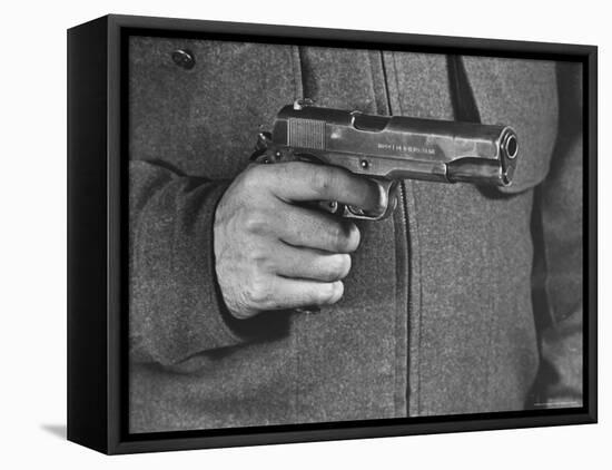 View of a Soldier Holding a US Army Colt Automatic .45 Caliber Pistol-William Vandivert-Framed Premier Image Canvas