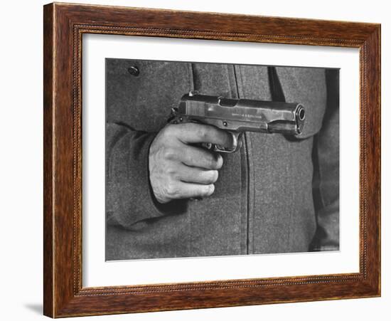 View of a Soldier Holding a US Army Colt Automatic .45 Caliber Pistol-William Vandivert-Framed Photographic Print