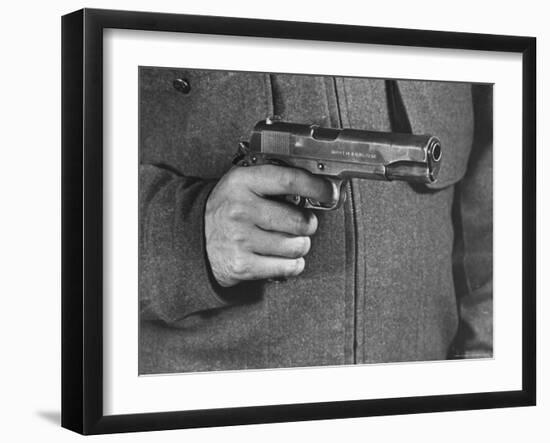 View of a Soldier Holding a US Army Colt Automatic .45 Caliber Pistol-William Vandivert-Framed Photographic Print