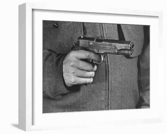 View of a Soldier Holding a US Army Colt Automatic .45 Caliber Pistol-William Vandivert-Framed Photographic Print