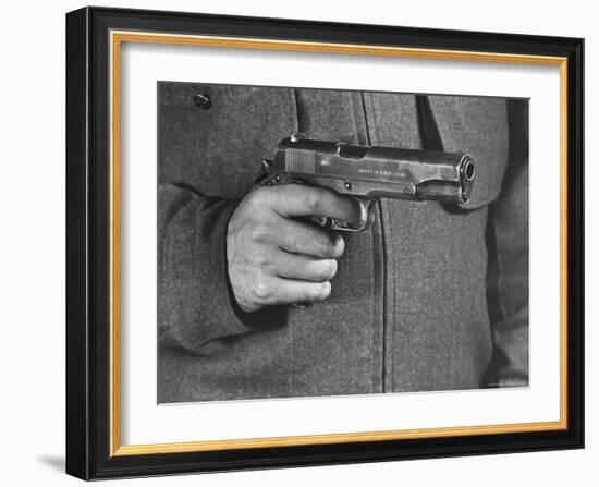 View of a Soldier Holding a US Army Colt Automatic .45 Caliber Pistol-William Vandivert-Framed Photographic Print