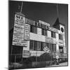 View of a Souvenir Store that Specializes in the Dionne Quintuplets Merchandise-Hansel Mieth-Mounted Photographic Print