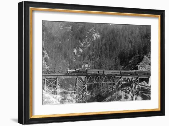 View of a Western Pacific Train on a Bridge - Plumas County, CA-Lantern Press-Framed Premium Giclee Print