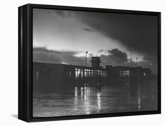 View of Airport and Runway at Dusk-Nat Farbman-Framed Premier Image Canvas