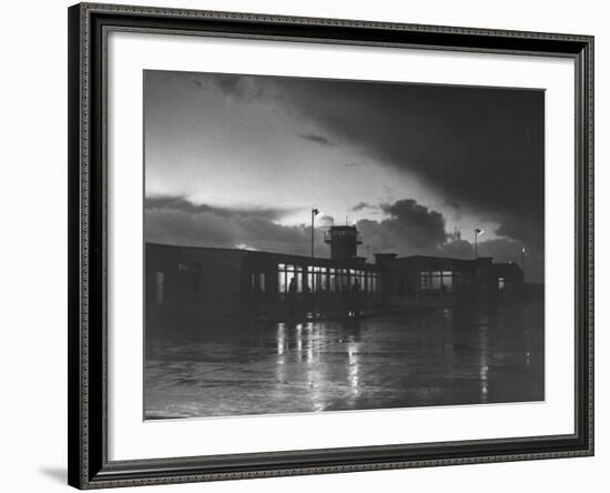 View of Airport and Runway at Dusk-Nat Farbman-Framed Premium Photographic Print