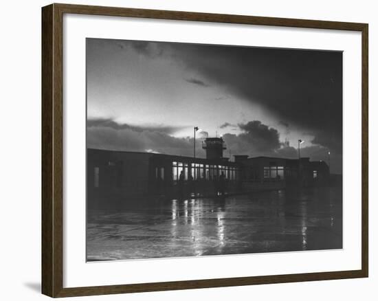 View of Airport and Runway at Dusk-Nat Farbman-Framed Premium Photographic Print