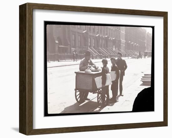 View of an Ice Cream Peddler on the Street, with Three Newsboys Buying Ice Cream, New York, c.1901-Byron Company-Framed Giclee Print