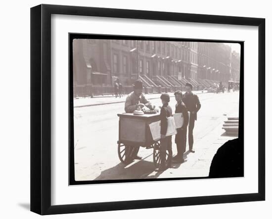 View of an Ice Cream Peddler on the Street, with Three Newsboys Buying Ice Cream, New York, c.1901-Byron Company-Framed Giclee Print