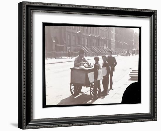 View of an Ice Cream Peddler on the Street, with Three Newsboys Buying Ice Cream, New York, c.1901-Byron Company-Framed Giclee Print