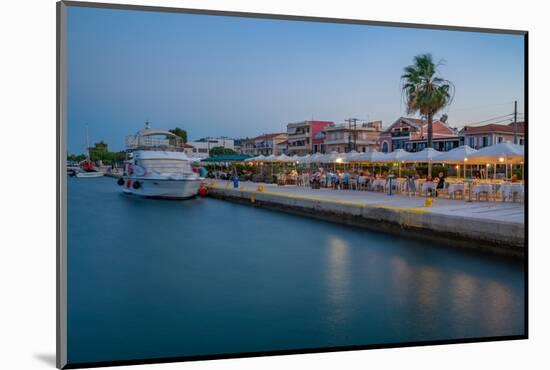 View of cafe and restaurant at the harbour at dusk, Lixouri, Kefalonia, Ionian Islands-Frank Fell-Mounted Photographic Print