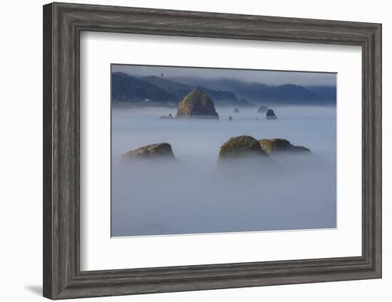 View of Cannon Beach with sea stacks with rising fog from Ecola State Park-Sylvia Gulin-Framed Photographic Print