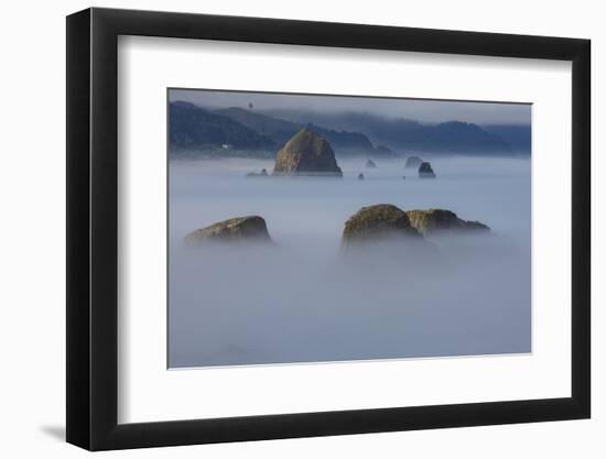 View of Cannon Beach with sea stacks with rising fog from Ecola State Park-Sylvia Gulin-Framed Photographic Print