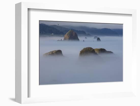 View of Cannon Beach with sea stacks with rising fog from Ecola State Park-Sylvia Gulin-Framed Photographic Print