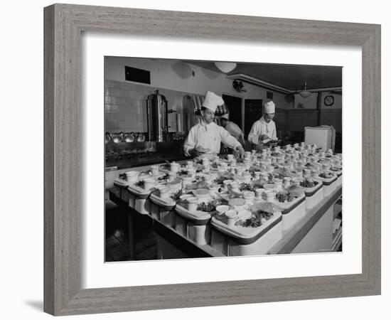 View of Chefs Preparing Food from a Story Concerning United Airlines-Carl Mydans-Framed Photographic Print