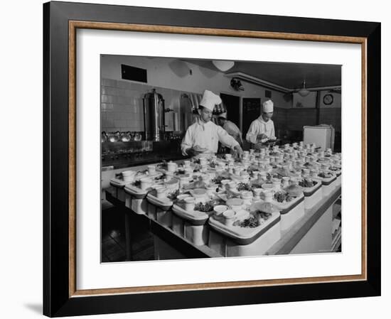 View of Chefs Preparing Food from a Story Concerning United Airlines-Carl Mydans-Framed Photographic Print