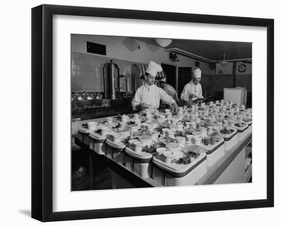 View of Chefs Preparing Food from a Story Concerning United Airlines-Carl Mydans-Framed Photographic Print