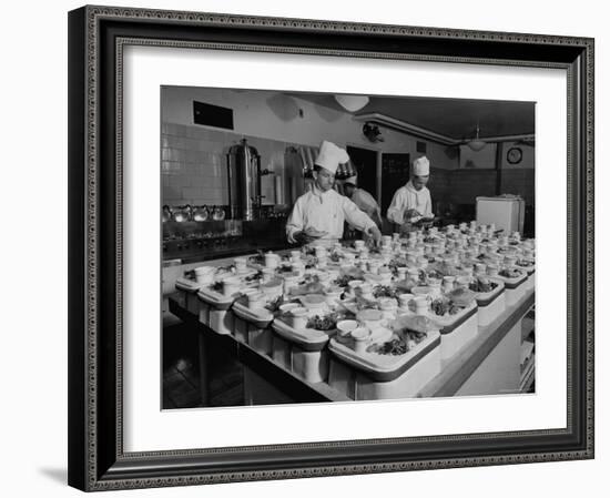 View of Chefs Preparing Food from a Story Concerning United Airlines-Carl Mydans-Framed Photographic Print