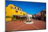 View of colourful buildings in Piazza Mediterraneo, San Teodoro, Sardinia, Italy, Mediterranean-Frank Fell-Mounted Photographic Print