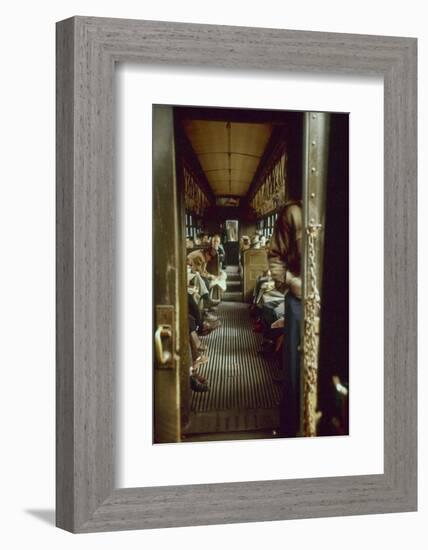 View of Commuters as They Ride in a Car on the Third Avenue Train, New York, New York, 1955-Eliot Elisofon-Framed Photographic Print