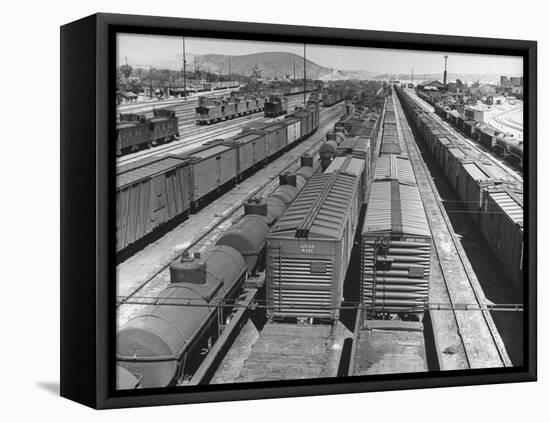 View of Freight Trains, Boxcars and Tank Cars, Standing on Tracks in Small Railroad Yard-null-Framed Premier Image Canvas