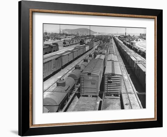 View of Freight Trains, Boxcars and Tank Cars, Standing on Tracks in Small Railroad Yard-null-Framed Photographic Print