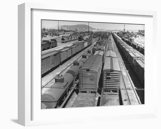 View of Freight Trains, Boxcars and Tank Cars, Standing on Tracks in Small Railroad Yard-null-Framed Photographic Print