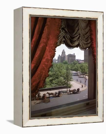 View of Handsome Cab Horse Drawn Carriages Outside the Plaza Hotel-Dmitri Kessel-Framed Premier Image Canvas