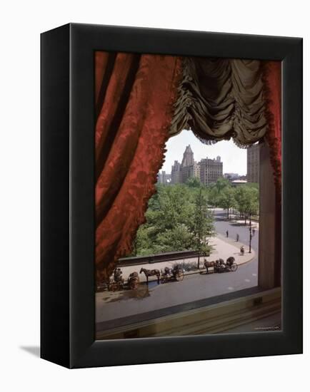 View of Handsome Cab Horse Drawn Carriages Outside the Plaza Hotel-Dmitri Kessel-Framed Premier Image Canvas