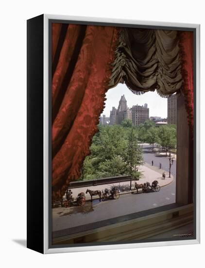 View of Handsome Cab Horse Drawn Carriages Outside the Plaza Hotel-Dmitri Kessel-Framed Premier Image Canvas