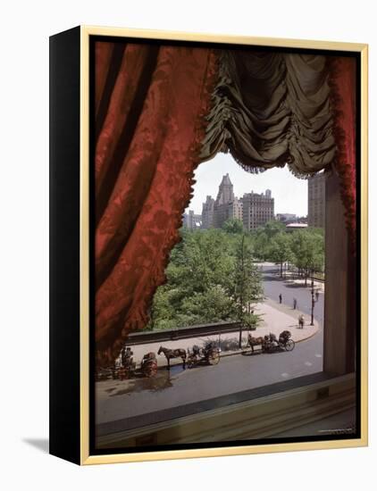 View of Handsome Cab Horse Drawn Carriages Outside the Plaza Hotel-Dmitri Kessel-Framed Premier Image Canvas