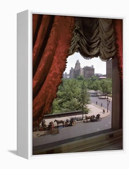 View of Handsome Cab Horse Drawn Carriages Outside the Plaza Hotel-Dmitri Kessel-Framed Premier Image Canvas