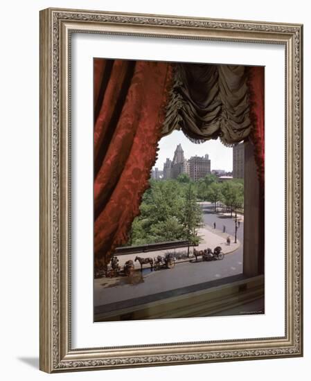 View of Handsome Cab Horse Drawn Carriages Outside the Plaza Hotel-Dmitri Kessel-Framed Photographic Print