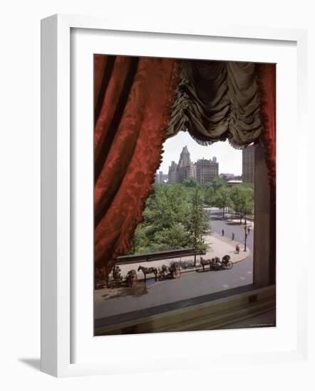 View of Handsome Cab Horse Drawn Carriages Outside the Plaza Hotel-Dmitri Kessel-Framed Photographic Print