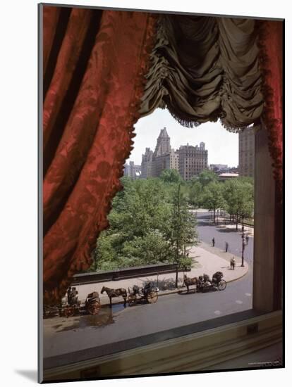 View of Handsome Cab Horse Drawn Carriages Outside the Plaza Hotel-Dmitri Kessel-Mounted Photographic Print