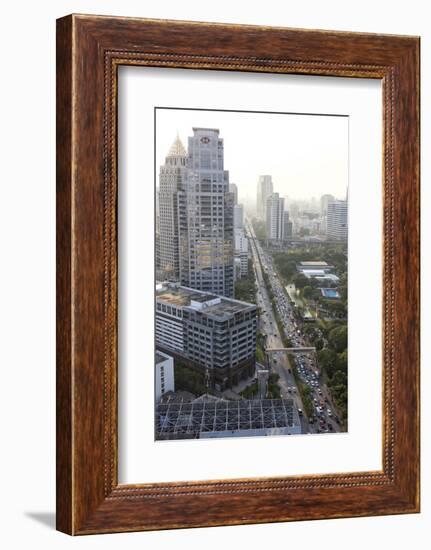 View of High Rise Buildings and Traffic Congestion on Rama Iv in Hazy Evening Light-Lee Frost-Framed Photographic Print