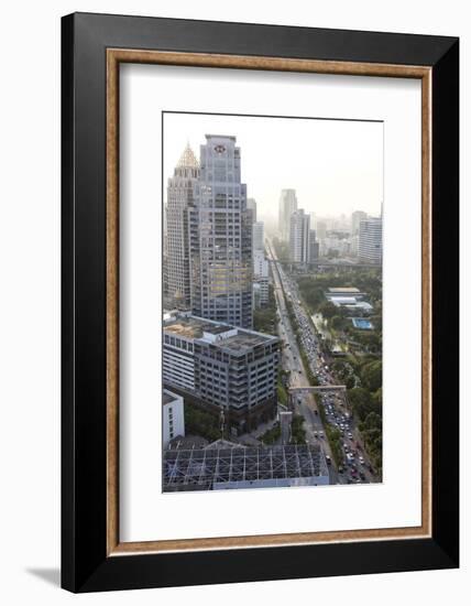 View of High Rise Buildings and Traffic Congestion on Rama Iv in Hazy Evening Light-Lee Frost-Framed Photographic Print