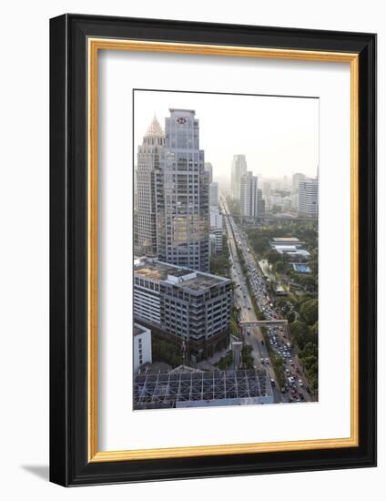 View of High Rise Buildings and Traffic Congestion on Rama Iv in Hazy Evening Light-Lee Frost-Framed Photographic Print