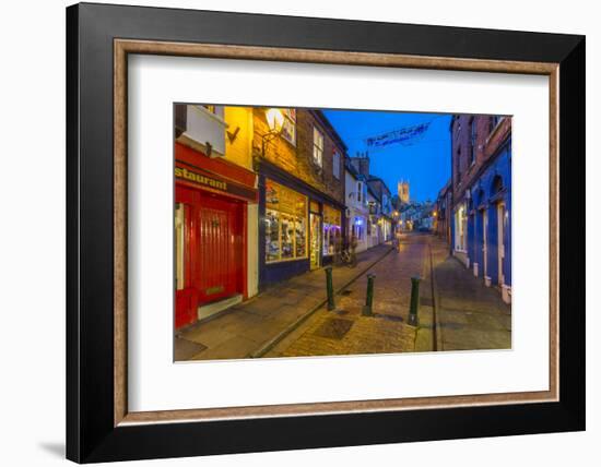 View of illuminated Lincoln Cathedral viewed from the cobbled Steep Hill at dusk, Lincoln, Lincolns-Frank Fell-Framed Photographic Print
