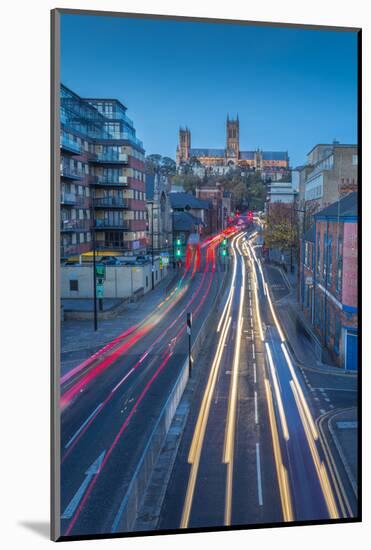 View of Lincoln Cathedral and traffic on Broadgate at dusk, Lincoln, Lincolnshire, England, United -Frank Fell-Mounted Photographic Print