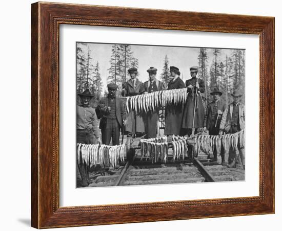 View of Men and Women with their Huge Trout Catch - Seward, AK-Lantern Press-Framed Art Print